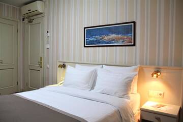 Фото номера Стандартный двухместный номер с 1 кроватью Отель Sharden Villa Hotel г. Тбилиси 9