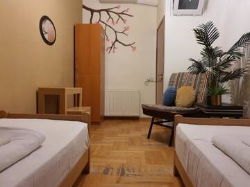 Фото номера Двухместный номер с 2 отдельными кроватями Хостелы Envoy Hostel г. Тбилиси 3