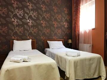 Фото номера Стандартный двухместный номер с 2 отдельными кроватями Отель Hotel Kalanga г. Тбилиси 4