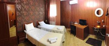 Фото номера Стандартный двухместный номер с 2 отдельными кроватями Отель Hotel Kalanga г. Тбилиси 2