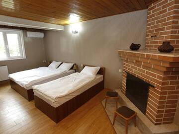 Фото номера Семейный люкс с 2 спальнями Отель Hotel Kalanga г. Тбилиси 2