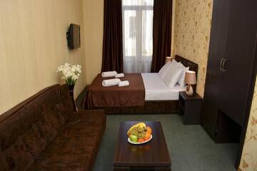 Фото номера Улучшенный двухместный номер с 1 кроватью Отель Hotel Margi г. Тбилиси 3