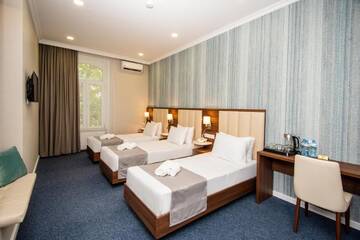 Фото номера Трехместный номер (3 односпальные кровати) Отель Hotel Margi г. Тбилиси 2