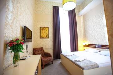 Фото номера Стандартный двухместный номер с 1 кроватью Отель Rustaveli Hotel г. Тбилиси 6