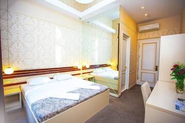 Фото номера Стандартный двухместный номер с 1 кроватью Отель Rustaveli Hotel г. Тбилиси 14