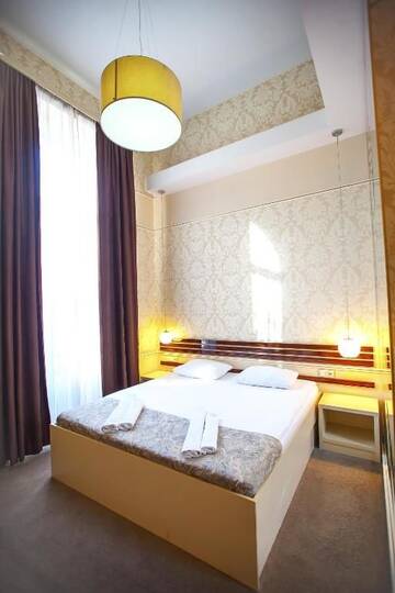 Фото номера Стандартный двухместный номер с 1 кроватью Отель Rustaveli Hotel г. Тбилиси 12