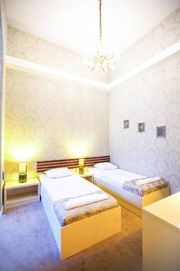 Фото номера Улучшенный двухместный номер с 2 отдельными кроватями Отель Rustaveli Hotel г. Тбилиси 10