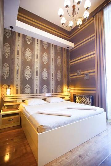 Фото номера Стандартный двухместный номер с 1 кроватью и балконом Отель Rustaveli Hotel г. Тбилиси 4