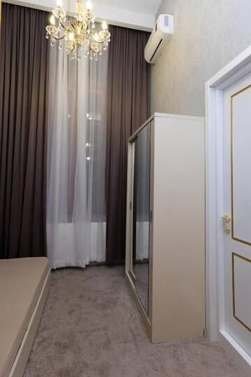 Фото номера Улучшенный двухместный номер с 2 отдельными кроватями Отель Rustaveli Hotel г. Тбилиси 4