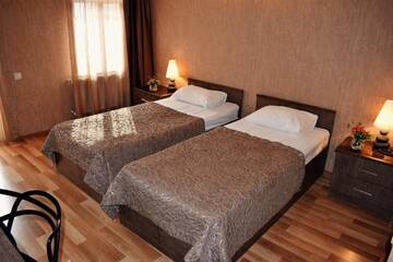 Фото номера Двухместный номер с 2 отдельными кроватями Отель Hotel Darchi г. Тбилиси 10