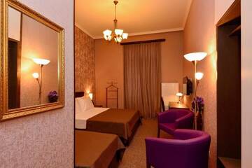 Фото номера Стандартный трехместный номер Отель King David Hotel г. Тбилиси 7