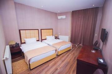 Фото номера Стандартный двухместный номер с 2 отдельными кроватями Отель Hotel Orion Budget г. Тбилиси 12