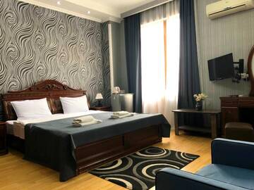 Фото номера Роскошный четырехместный номер Отель Bonus Hotel г. Тбилиси 4