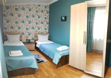 Фото номера Двухместный номер с 2 отдельными кроватями и видом на город Отель Bonus Hotel г. Тбилиси 2