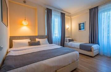 Фото номера Стандартный двухместный номер с 2 отдельными кроватями Отель Iliani Hotel г. Тбилиси 9