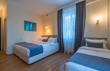 Фото номера Стандартный двухместный номер с 2 отдельными кроватями Отель Iliani Hotel г. Тбилиси 5
