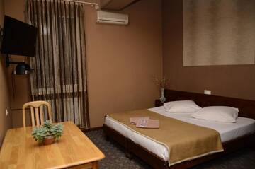 Фото номера Двухместный номер с 1 кроватью Отель Mkudro Hotel г. Тбилиси 13