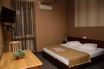 Фото номера Двухместный номер с 1 кроватью Отель Mkudro Hotel г. Тбилиси 6