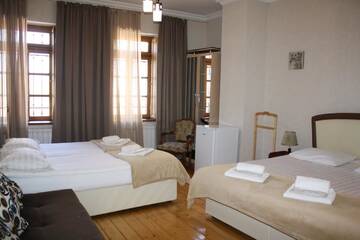 Фото номера Улучшенный семейный номер Гостевой дом Guest House Lusi г. Тбилиси 4