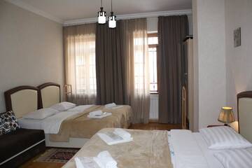 Фото номера Улучшенный семейный номер Гостевой дом Guest House Lusi г. Тбилиси 10
