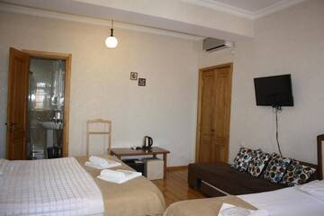 Фото номера Улучшенный семейный номер Гостевой дом Guest House Lusi г. Тбилиси 9