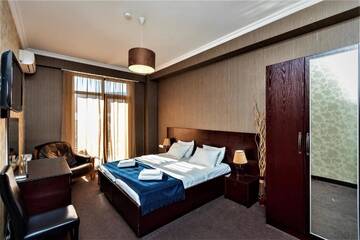 Фото номера Стандартный двухместный номер с 2 отдельными кроватями Отель Hotel Sololaki г. Тбилиси 3