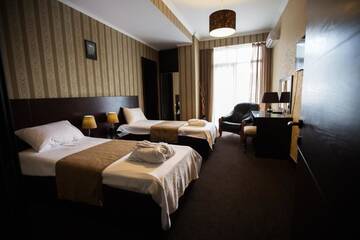 Фото номера Стандартный двухместный номер с 2 отдельными кроватями Отель Hotel Sololaki г. Тбилиси 8