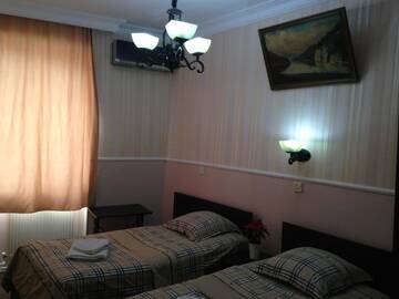 Фото номера Бюджетный двухместный номер с 2 отдельными кроватями Мини-отель Kipiani Guest house г. Тбилиси 2