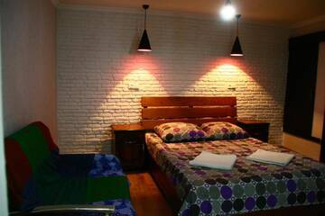 Фото номера Cемейный номер с собственной ванной комнатой Мини-отель Kipiani Guest house г. Тбилиси 4
