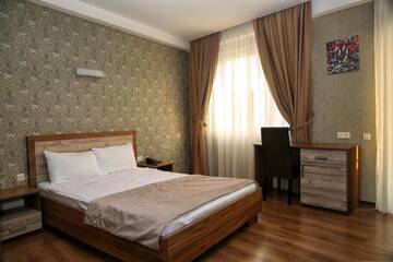 Фото номера Двухместный номер с 1 кроватью и балконом Отель Hotel Gureli г. Тбилиси 4