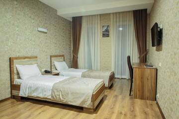 Фото номера Двухместный номер с 2 отдельными кроватями Отель Hotel Gureli г. Тбилиси 2