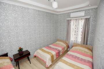 Фото номера Двухместный номер с 2 отдельными кроватями Гостевой дом Guest house Sabina г. Тбилиси 3
