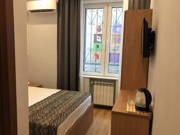 Фото номера Двухместный номер с 1 кроватью Отель Downtown Hotel Tbilisi г. Тбилиси 6