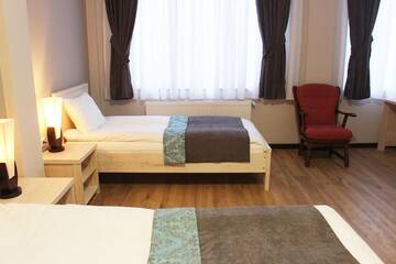 Фото номера Стандартный двухместный номер с 2 отдельными кроватями Отель Hotel Suliko г. Тбилиси 16