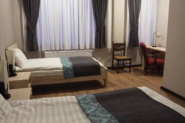 Фото номера Стандартный двухместный номер с 2 отдельными кроватями Отель Hotel Suliko г. Тбилиси 11