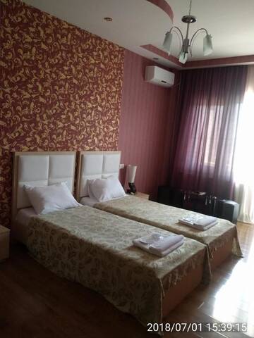 Фото номера Двухместный номер с 2 отдельными кроватями и балконом Отель Hotel Stal+ г. Тбилиси 8