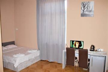Фото номера Семейный номер Отель FangXin Hotel г. Тбилиси 5