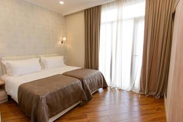 Фото номера Апартаменты с 2 спальнями Отель Apart Hotel MX г. Тбилиси 22