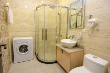 Фото номера Апартаменты с 2 спальнями Отель Apart Hotel MX г. Тбилиси 24