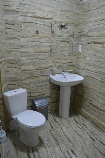 Фото номера Стандартный семейный номер Отель Renaissance Hotel Tbilisi г. Тбилиси 7