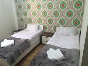 Фото номера Двухместный номер с 2 отдельными кроватями Отель Renaissance Hotel Tbilisi г. Тбилиси 10