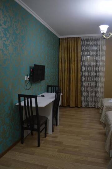 Фото номера Трехместный номер Отель Renaissance Hotel Tbilisi г. Тбилиси 5