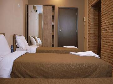Фото номера Бюджетный трехместный номер Отель Tiflis Hotel г. Тбилиси 2
