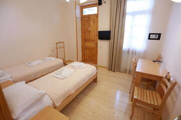Фото номера Улучшенный семейный номер Гостевой дом Guest House Goari г. Тбилиси 6