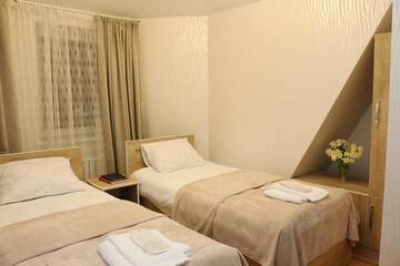 Фото номера Двухместный номер с 2 отдельными кроватями Отель Hotel Residence Hill г. Тбилиси 2