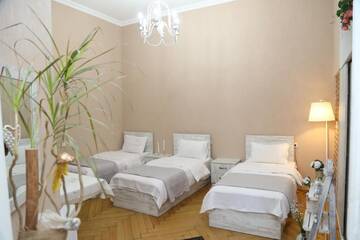 Фото номера Классический трехместный номер Отель Atlant Hotel г. Тбилиси 3