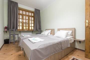 Фото номера Стандартный двухместный номер с 2 отдельными кроватями Отель Jako Boutique Hotel г. Тбилиси 5