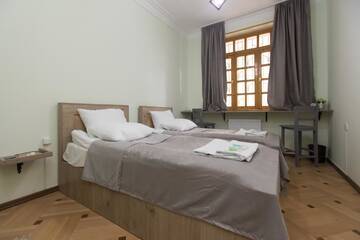 Фото номера Стандартный двухместный номер с 2 отдельными кроватями Отель Jako Boutique Hotel г. Тбилиси 7