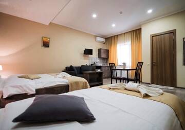 Фото номера Трехместный номер Делюкс Отель Hotel Nabadi г. Тбилиси 6