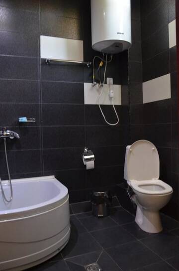 Фото номера Стандартный одноместный номер с душем Отель Hotel Kourosh г. Тбилиси 5